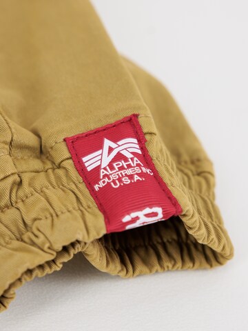 ALPHA INDUSTRIES Tapered Nadrág - zöld