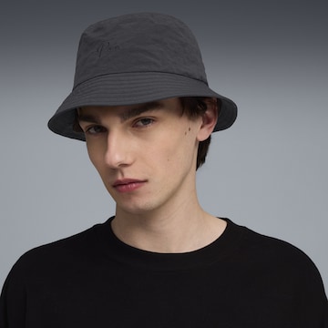 PUMA Hoed 'Premium Essentials' in Zwart