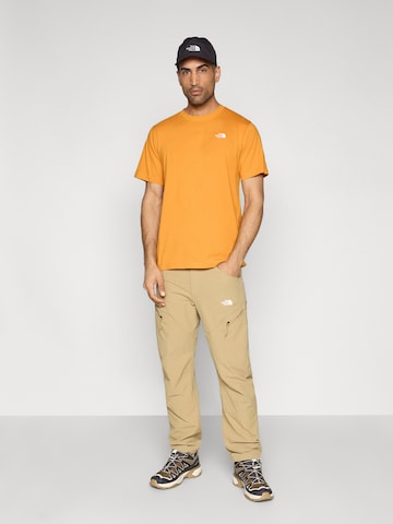 Tricou 'EVOLUTION SIMPLE DOME' de la THE NORTH FACE pe portocaliu