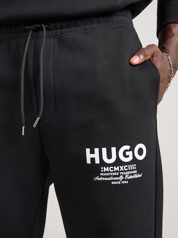 Tuta da jogging 'NazardoNev' di HUGO in nero