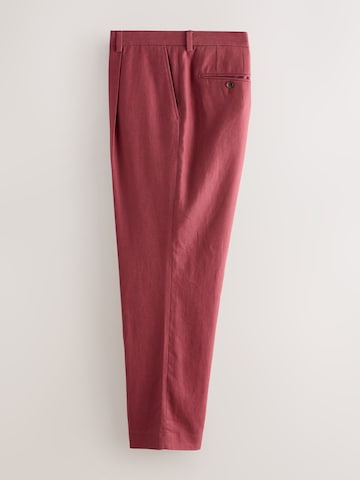 Loosefit Pantaloni con piega frontale di Next in rosso