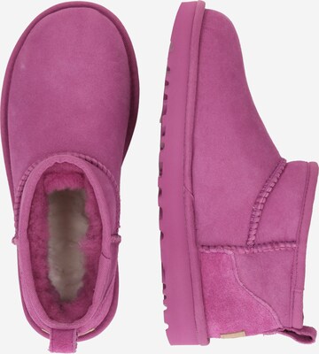 Bocanci de zăpadă 'CLASSIC ULTRA MINI' de la UGG pe roz