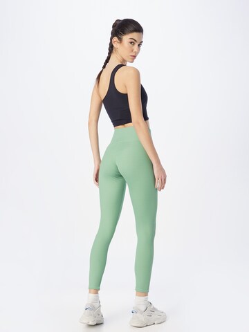 Champion Authentic Athletic Apparel Skinny Športne hlače | zelena barva