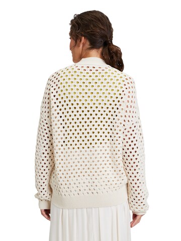 Cartoon Strickjacke in Beige
