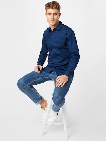 ABOUT YOU x Kevin Trapp Regular fit Button Up Shirt 'Jasper' in Blue
