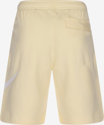 Nike Sportswear Regular Pants 'Club' in Yellow