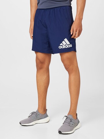 ADIDAS SPORTSWEAR Regularen Športne hlače 'Run It' | modra barva: sprednja stran