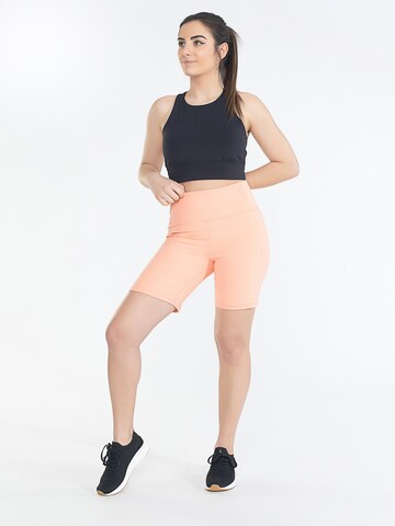 Skinny Pantalon de sport Spyder en orange