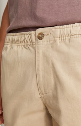 Regular Pantalon Scalpers en beige