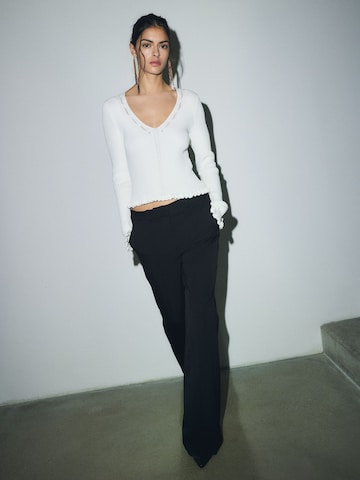 évasé Pantalon à plis Bhoem en noir
