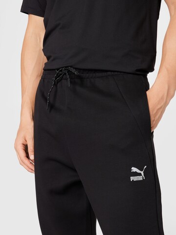 PUMA Tapered Sportbroek in Zwart