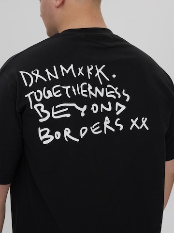 Dxnmxrk T-Shirt 'Gya' in Schwarz
