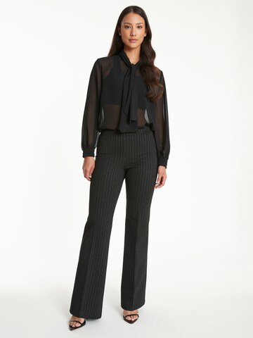 Ana Alcazar Flared Trousers with creases 'Tawera' in Black: front