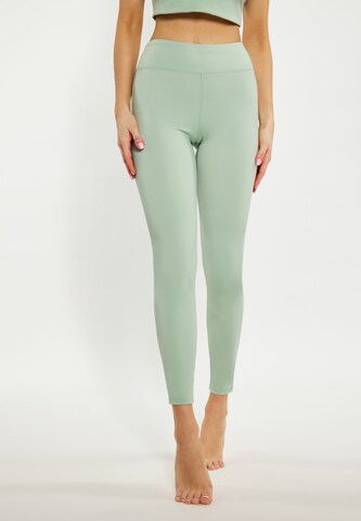 IZIA Skinny Workout Pants in Green: front