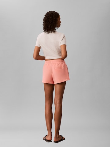 Regular Pantalon Calvin Klein Jeans en rose