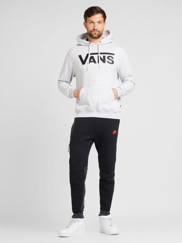 Nike Sportswear Tapered Housut 'TECH FLEECE' värissä musta