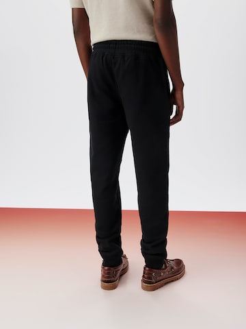 ABOUT YOU x Kingsley Coman Tapered Hose 'Lio' in Schwarz