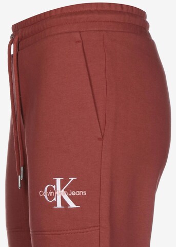 Calvin Klein Jeans Zúžený strih Nohavice - Červená