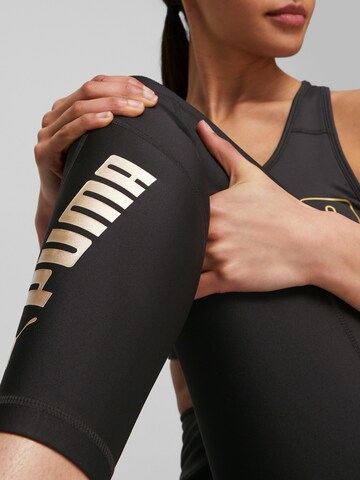 PUMA Skinny Sportbroek in Zwart