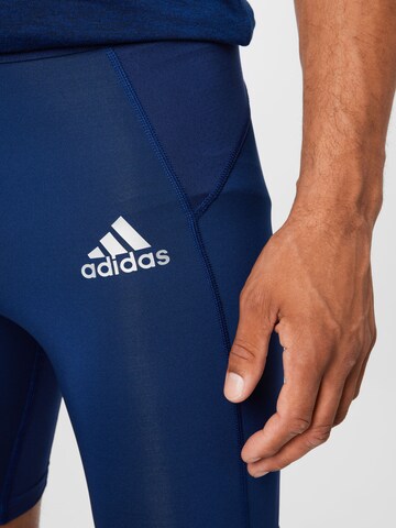 ADIDAS SPORTSWEAR Skinny Sportnadrágok 'Techfit ' - kék