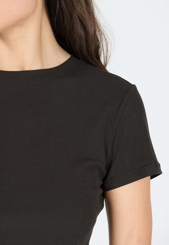 Athlecia Functioneel shirt 'Tinashe' in Zwart