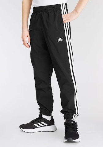 ADIDAS SPORTSWEAR Tapered Workout Pants 'Essentials 3-Stripes ' in Black: front