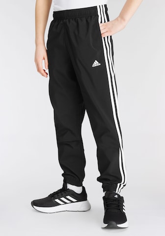 ADIDAS SPORTSWEAR Tapered Παντελόνι φόρμας 'Essentials 3-Stripes ' σε μαύρο: μπροστά