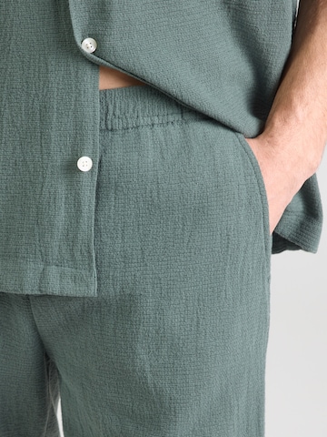 SELECTED - Ajuste confortable Ropa para correr 'SLHRLXCAL' en verde