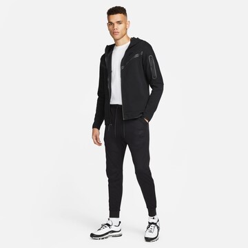 Nike SportswearTapered Hlače 'Tech Essentials' - crna boja