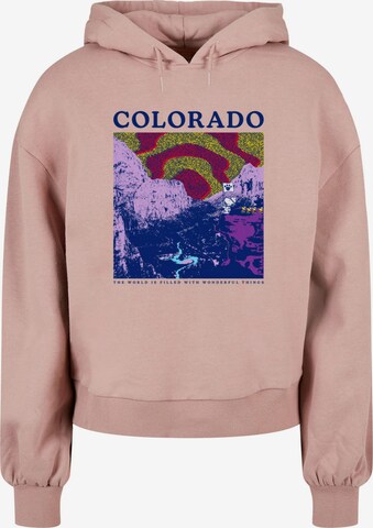 Merchcode Sweatshirt 'Peanuts - Colorado' in Pink: front