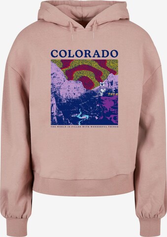 Merchcode Sweatshirt 'Peanuts - Colorado' in Pink: predná strana