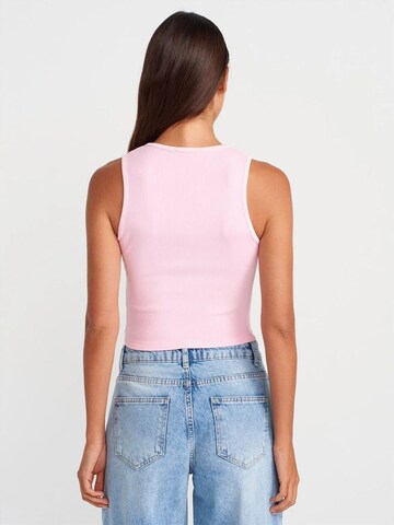 Top di Dilvin in rosa