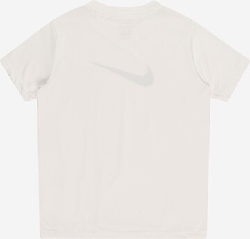 T-Shirt fonctionnel NIKE en blanc