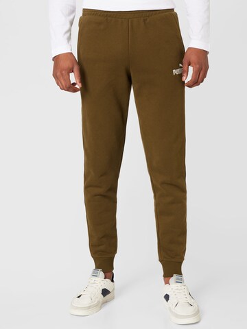 PUMA Tapered Workout Pants in Green: front