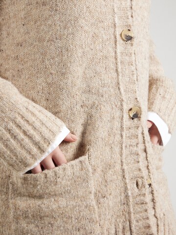 Vero Moda Curve Pletena jopa 'VMCIngrid' | bež barva