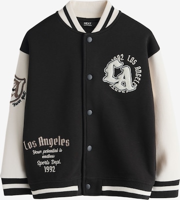 Next Välikausitakki värissä musta: etupuoli