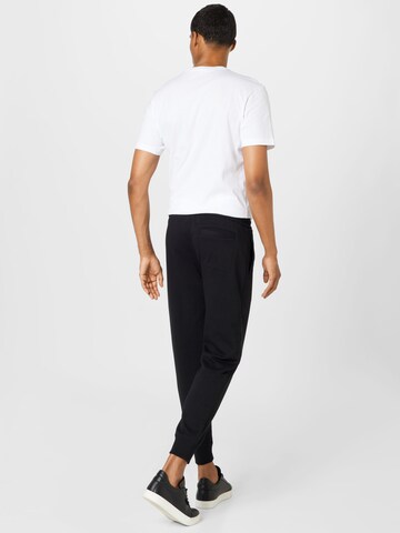 Tapered Pantaloni de la Calvin Klein Jeans pe negru