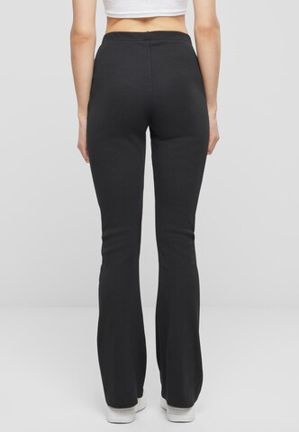 Karl Kani Flared Trousers in Black