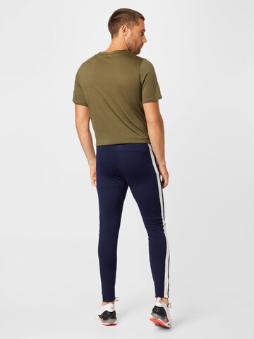 Skinny Pantaloni sportivi di ICEBREAKER in blu