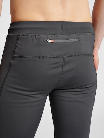 Skinny Pantalon de sport Newline en gris