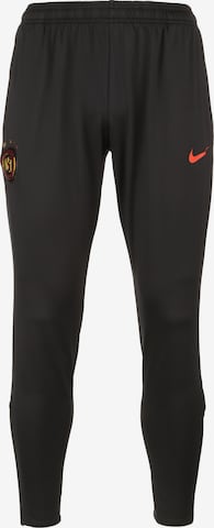 Coupe slim Pantalon de sport NIKE en noir : devant