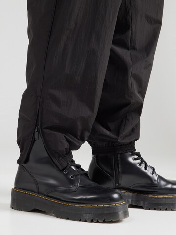 Han Kjøbenhavn Конический (Tapered) Штаны в Черный