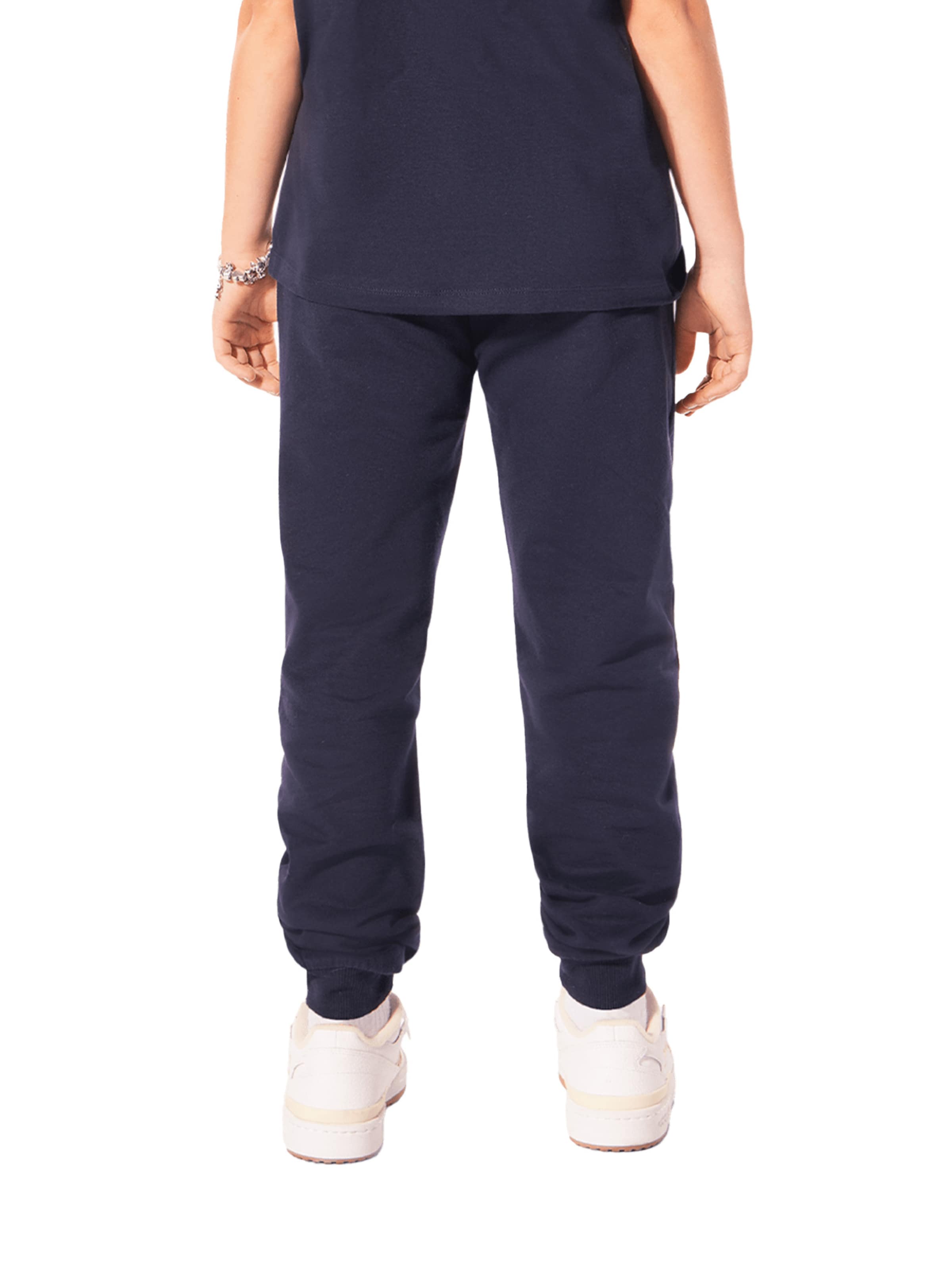 FC BAYERN MÜNCHEN Tapered Pants 'Essential' in Blue