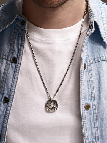 Pendentif 'ELEMENT OGIEŃ' REYTEL en argent : devant