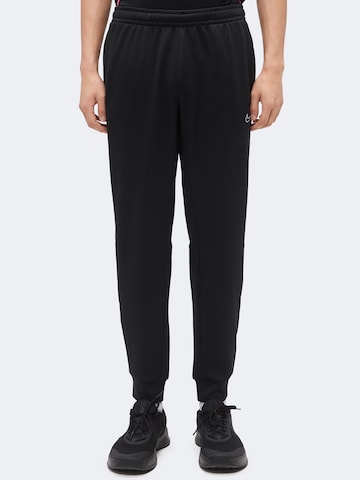 NIKE Tapered Sporthose 'Flex' in Schwarz: Vorderseite