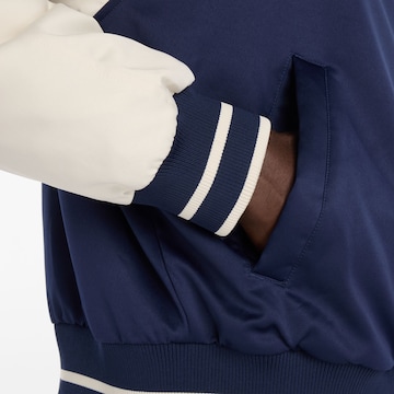 new balance Tussenjas 'Athletics Varsity' in Blauw