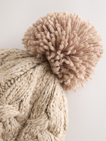Next Muts in Beige