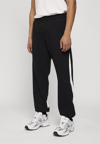 Unfair Athletics Tapered Broek in Zwart: voorkant