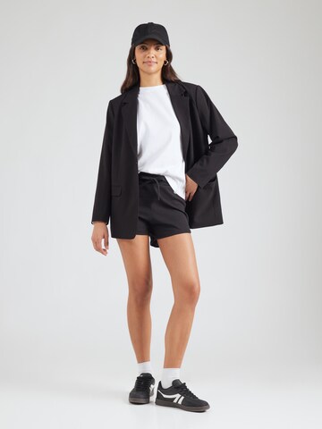 Regular Pantaloni de la Champion Authentic Athletic Apparel pe negru