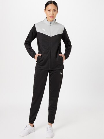 PUMA Trainingsanzug 'Individual Rise' in Schwarz: predná strana